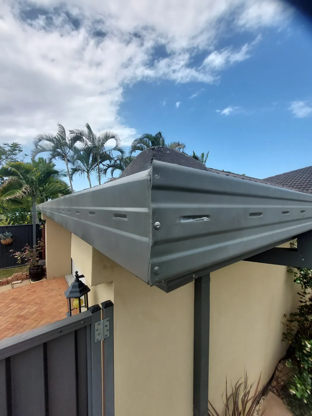 New Colorbond gutter and fascia installed on a Gold Coast carport by our roof plumbers