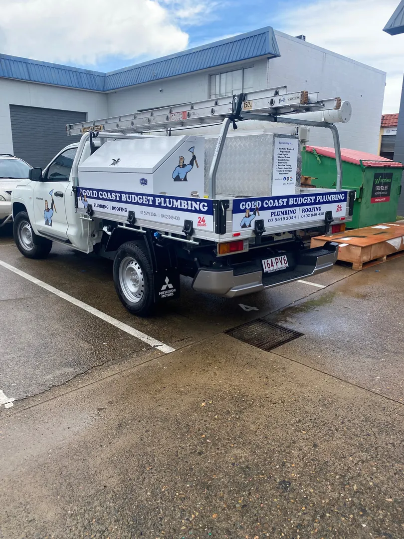 Gold Coast Budget Plumbing branded service ute stocked for plumbing and roofing call-outs